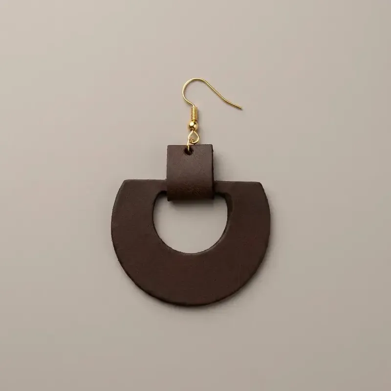 il_794xN.7966303982_bv86 Geometric Leather Drop Earrings - Image 1